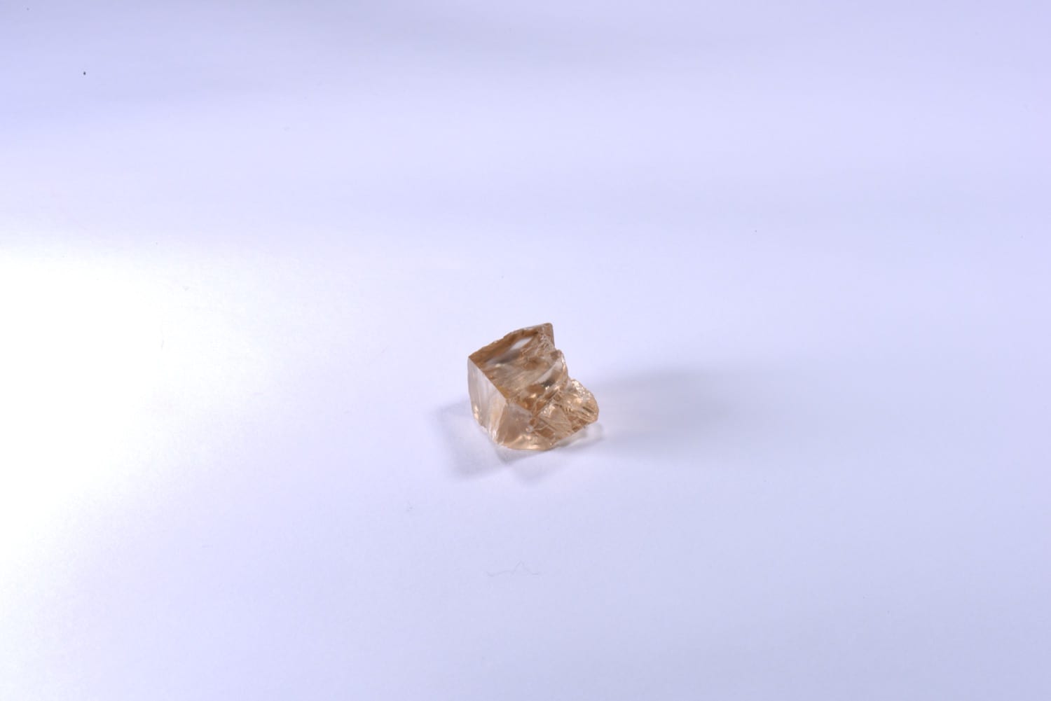 An uncut rough diamond crystal showing natural crystal faces
