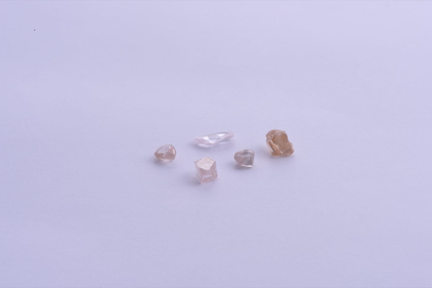 Uncut rough diamonds awaiting the cutter